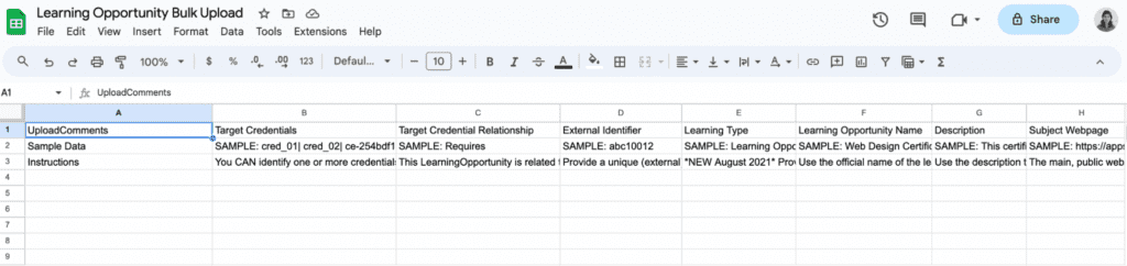 The downloaded template open in a spreadsheet: property headers in row 1, sample data and instructions in rows 2 and 3.